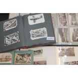 Postcards accumulation in various albums and folders - including an album of aviation,