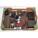 Quantity of cameras - comprising 35mm SLRs by Minolta, Praktica and Petri,