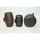 Two iron bound oak costrels in the form of barrels and one other of circular form, marked - G. R.