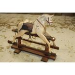 Painted Pine Rocking Horse - on cantilever-action pine stand, advertising name on stand - Barr no.