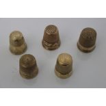 Antique yellow metal thimble engraved with buildings and inscribed - 'Lizzio', 2cm high,