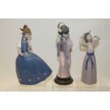 Three Lladro porcelain figures - girl in blue dress,