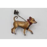 Unusual silver dog brooch, painted gilt with red collar,