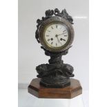 Unusual late Victorian mantel clock with bronzed spelter globe case decorated with signs of the