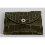 Modern green leather key wallet by Asprey, textured to simulate alligator skin,