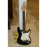 Encore Strat-style six-string electric guitar with black finish