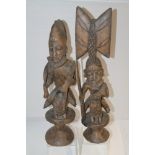 Pair of Nigerian carved wood tribal figures - each depicted as a warrior on horseback,