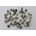 Collection of antique silver and white metal thimbles - various designs (approximately 50)