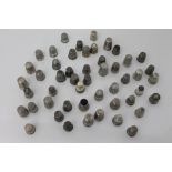 Collection of antique silver and white metal thimbles - variously marked,