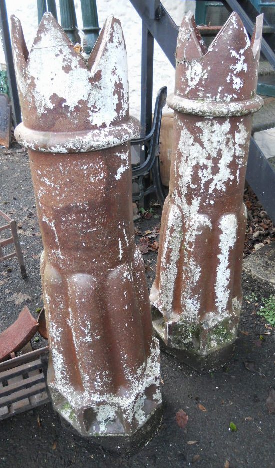 A pair of 3' 11" Victorian "The Champion" crowned chimney pots
