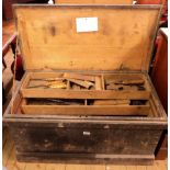 A Victorian painted pine carpenter's chest containing original tools, including a large range of