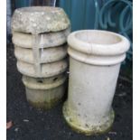 Two chimney pots, one fluted the other by Sandford Pottery, Wareham