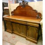 A 6' Victorian mahogany sideboard with ornate raised back, three blind frieze drawers, pair of