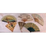 A small collection of vintage paper fans, including Oriental, Red Starline, etc.