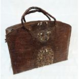 A crocodile skin tote bag