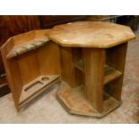 A 26 3/4" 1930's walnut octagonal drinks cabinet with fitted interior enclosed by two doors and