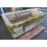 A 5' long well carved and deep cut granite trough with chamfered rim - 33" wide x 20" deep