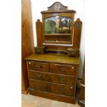 A 36" Edwardian walnut dressing chest with bevelled mirror, shelf and flanking trinket drawers, over