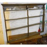 A 6' 3" 19th Century continental stained oak four narrow shelf open plate rack with moulded