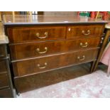 A 4' Regency style mahogany, strung and cross banded dressing chest of two short and two long