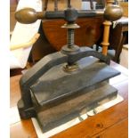 A 19" Victorian steel and brass book press