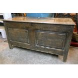 A 3' 7 1/2" antique oak coffer with double panelled front and later base panel
