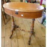 A 27" Victorian stained oak drum work table with swivel top enclosing two lidded compartments, set