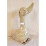 A 16" cream glazed pottery duck