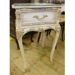 A pair of French style shaped mirror topped, painted and gessoed bedside tables with single