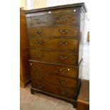 A 3' 6" early 19th Century mahogany chest on chest with dentil cornice, two short and six long