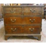 A 3' 1" early 19th Century oak chest of two short and two long graduated drawers, set on bracket