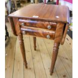 A 19th Century mahogany work table with flanking drop-leaf and two cushion shape drawers, set on
