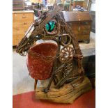 Richard Dawson Hewitt: a large horse head formed from found objects, set on a driftwood rustic
