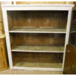 A 4' 8" antique painted pine open shelf unit with three wide shelves