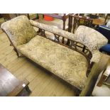 A 5' 10" late Victorian walnut framed chaise longue with tapestry upholstery and decorative
