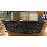 A 19½" 18th Century oak bible box with old lock plate and carved medieval tulip motifs to front -