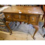 A 31" 18th Century style stained wood lowboy with moulded top, compass point and chevron decoration,