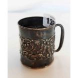 A small silver christening mug with band of embossed classical decoration featuring puti catching