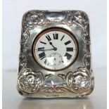 A silver plated cased Goliath pocket watch, with silver fronted bedside stand - Birmingham 1905