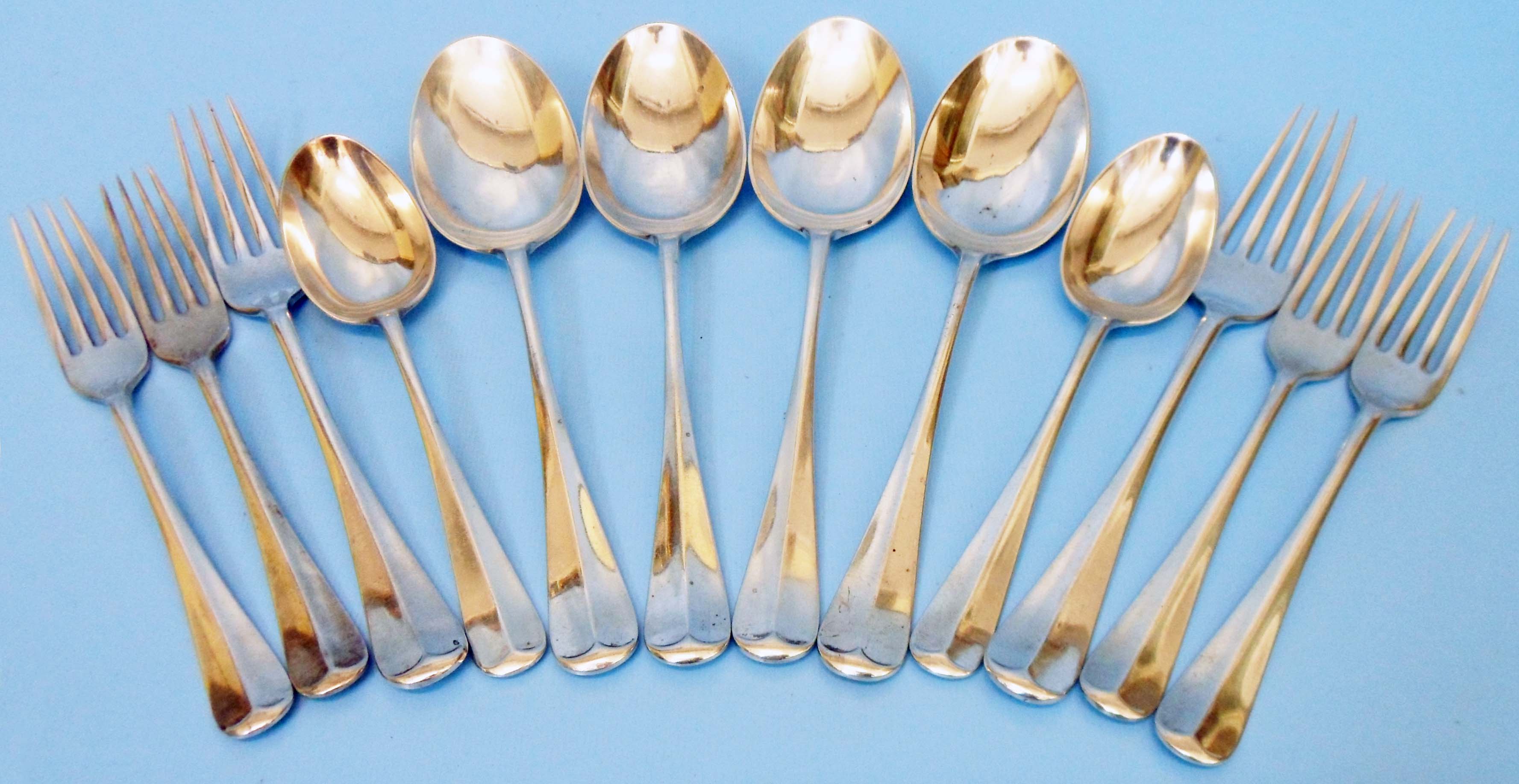 A small collection of English silver rat tail spoons and forks - Sheffield 1923 James Deakin &