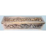 A 6¼" Anglo-Indian white metal oblong lift-top trinket box with all round embossed Indian animals in