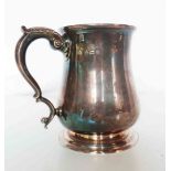 An early 20th Century silver baluster tankard with scroll handle by Elkington & Co., with later
