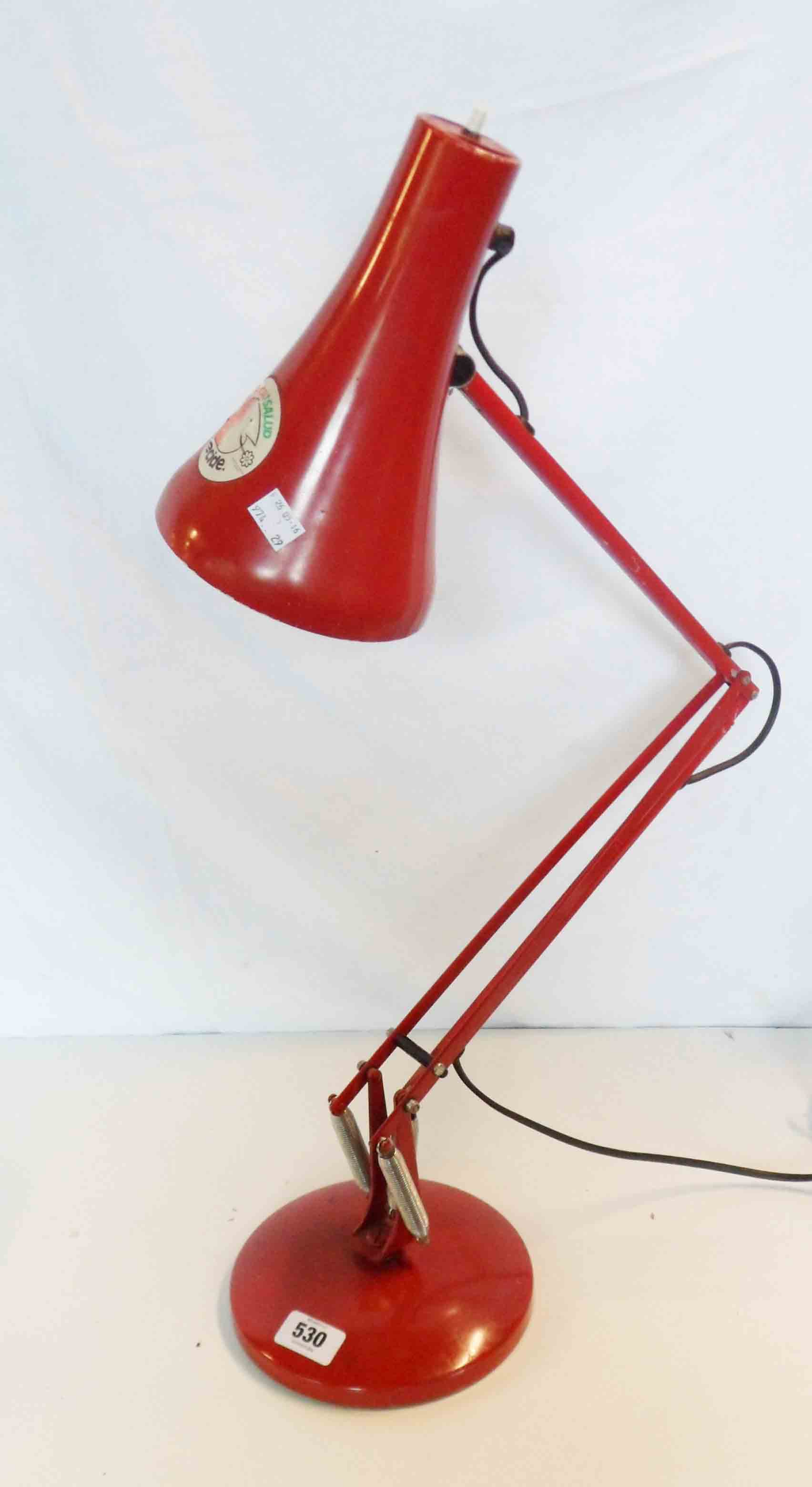 An Anglepoise Type 90 lamp in red colourway