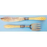A pair of Victorian silver fish servers, with engraved decoration and rope twist ivory handles -