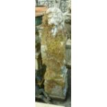 A 31" stone lion sejant erect with shield statue, set on an 11" stone pedestal