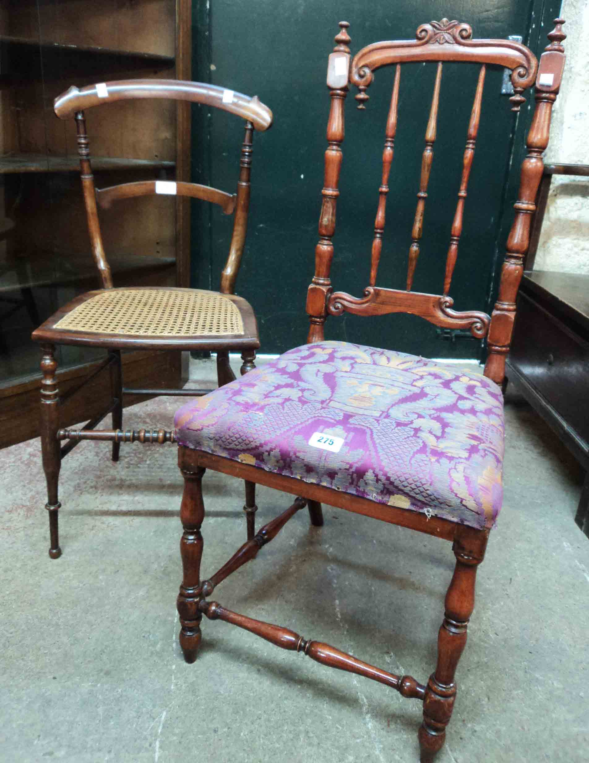 A late Victorian stained wood framed bedroom chair with ornate spindle back and later upholstered