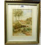 E. Wake Cook: a framed 19th Century watercolour of a country landscape, depicting a river and bridge