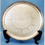 A 14" diameter Victorian Elkington & Co. silver salver with beaded rim and engraved decoration,