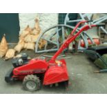 A MTD 450 rotavator with rear-tine tiller and dual direction tines, 5HP 205cc Briggs & Stratton