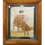 A mid 19th Century maple framed embroidered picture depicting a young child riding on horseback,